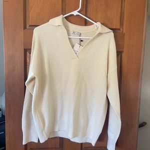 And long sleeve polo sweater